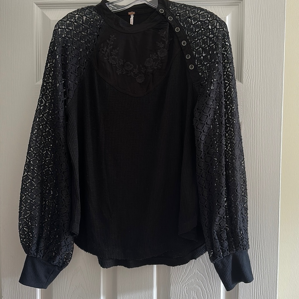 Free People black multi media top with embroidery on front and back.